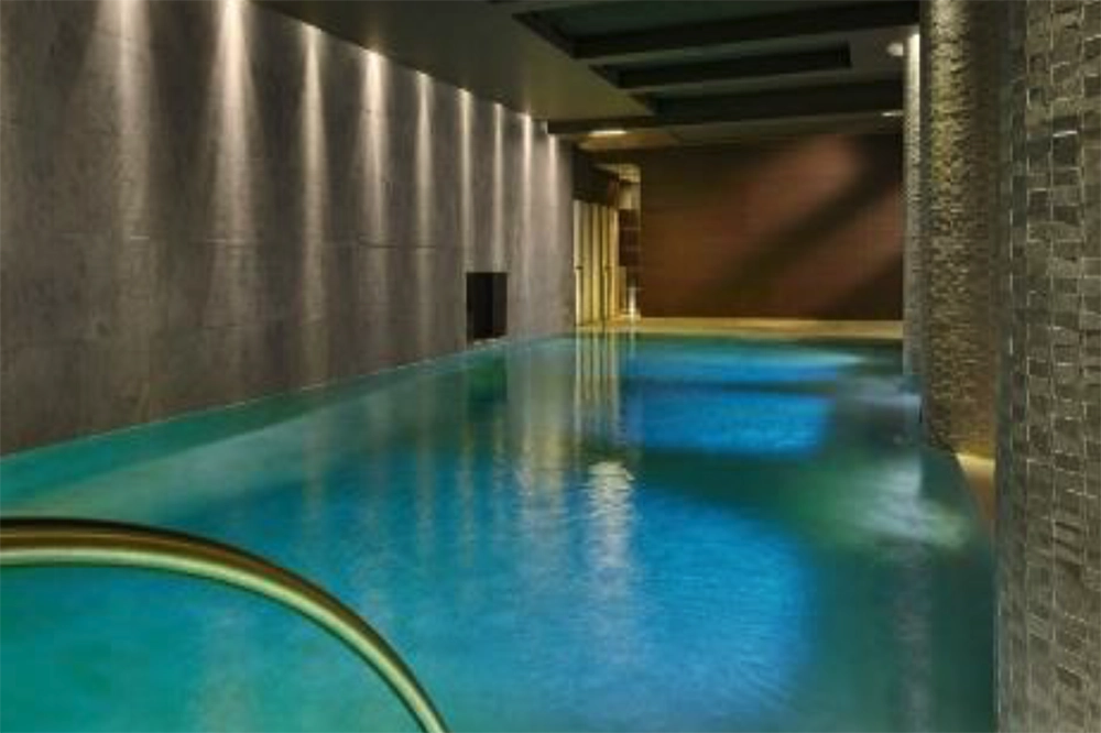 Réalisation de la piscine, du spa et de l'espace wellness de l'Hôtel Garden Golf à Crans-Montana par Millius Groupe